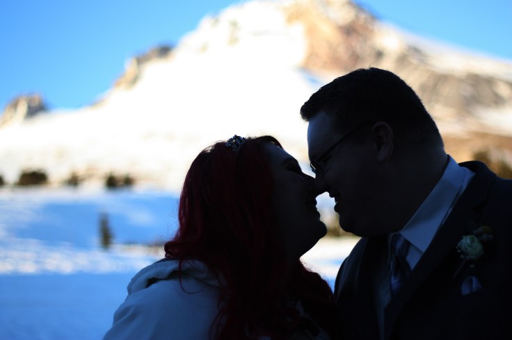 Sneaking another kiss as the sun sets on Mt. Hood. 