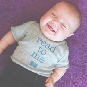 My squishy niece in the Novel Novice onesie I made her.